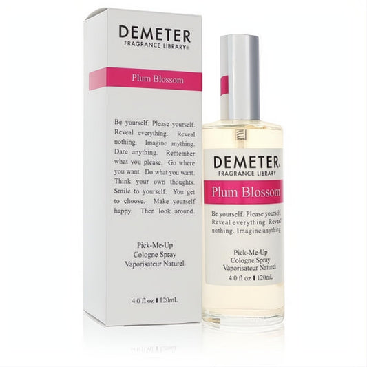 Tangy-sweet Demeter Plum Blossom 4 oz cologne spray. Clear glass bottle, silver cap, vibrant pink & white label, with its matching box.