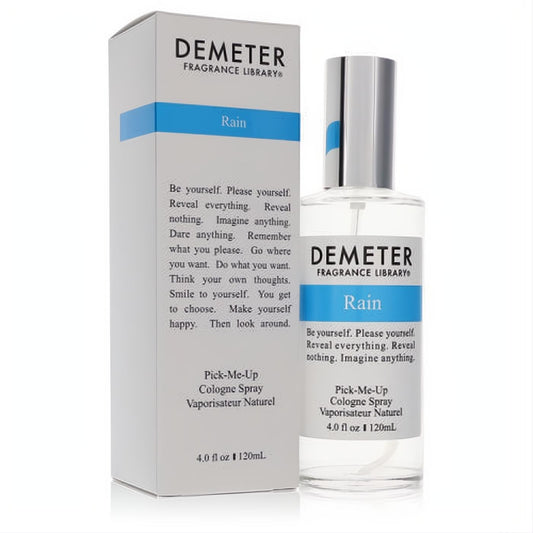 Refreshing Demeter Rain 4 oz unisex cologne spray. Clear glass bottle, silver cap, and elegant white box with a blue "Rain" label.