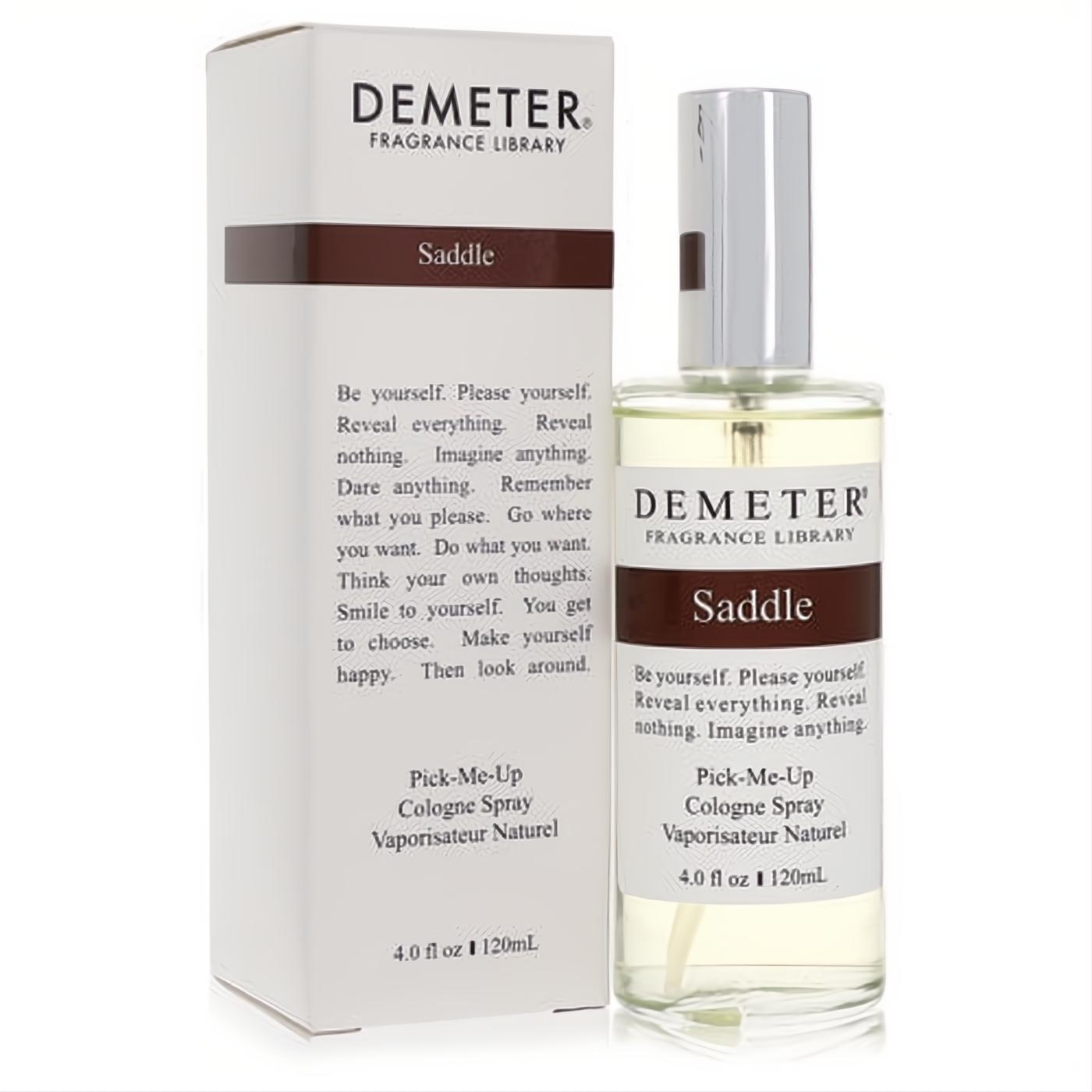 Demeter Saddle 4 oz cologne spray: sophisticated clear glass bottle, silver cap, and crisp white box with brown band.