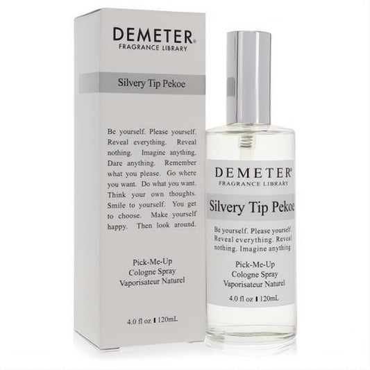 Elegant Demeter Silvery Tip Pekoe 4 oz cologne spray in a clear glass bottle with a sleek silver cap, beside its white box.