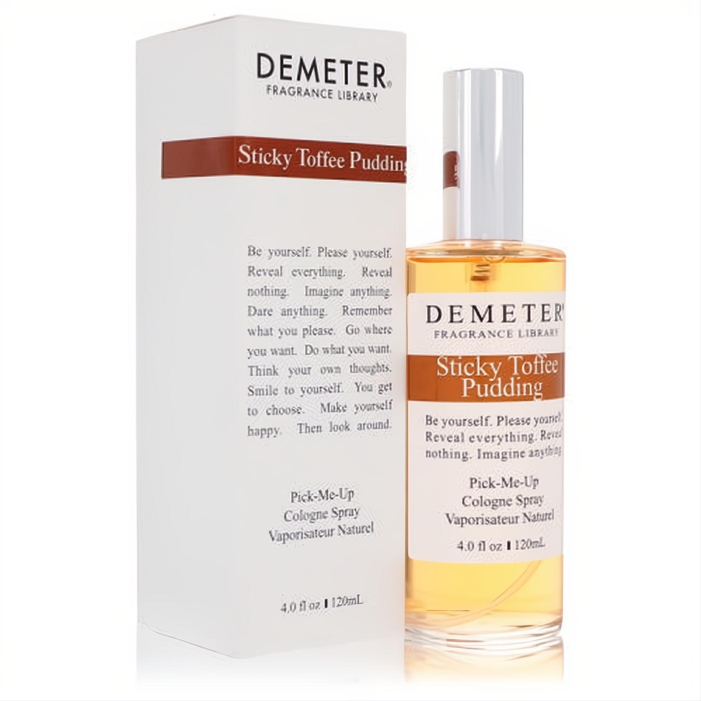 Demeter Sticky Toffee Pudding 4 oz cologne spray. Clear glass bottle with amber liquid, white cap, and matching white box. Experience this sweet gourmand fragrance.