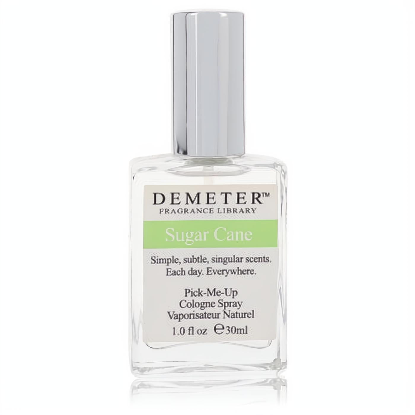 Demeter Sugar Cane 1 oz cologne in a minimalist clear glass bottle with a sleek silver cap and vibrant green label.
