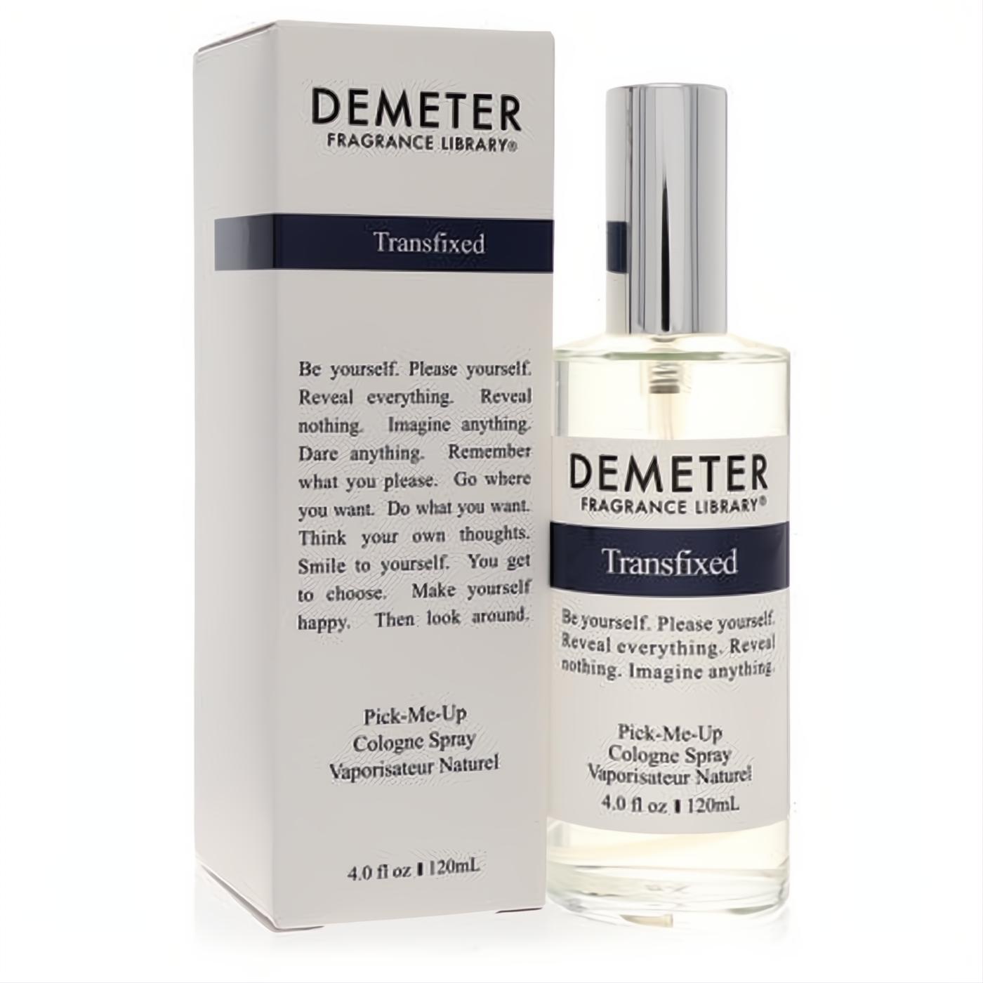 Elegant Demeter Transfixed 4 oz cologne spray in a clear glass bottle with a silver cap, displayed next to its crisp white packaging.