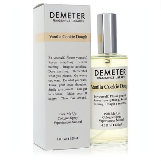 Indulge in Demeter Vanilla Cookie Dough 4 oz unisex cologne. Clear glass spray bottle, silver cap, and sleek white box with beige accent.