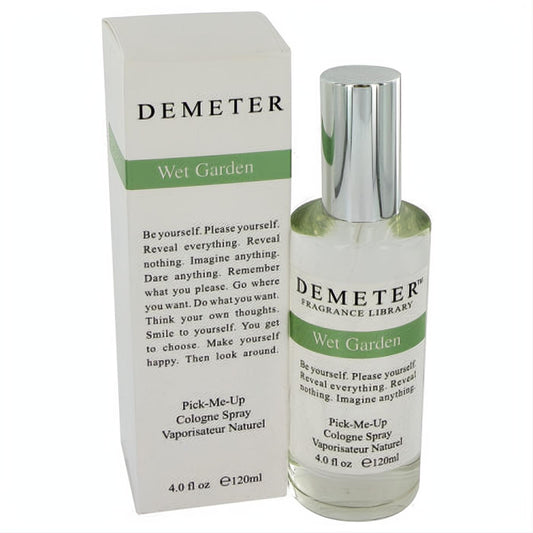 Demeter Wet Garden 4 oz cologne spray in a clear bottle with sleek silver cap, beside its crisp white and green box.