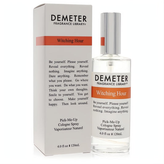Demeter Witching Hour 4 oz cologne spray. Clear glass bottle with silver cap, white label, and vibrant orange accent.