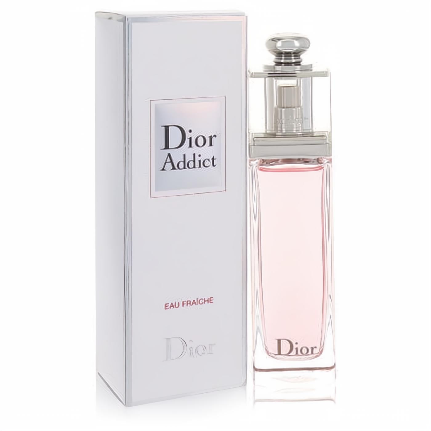 Discover Dior Addict Eau Fraiche. Chic clear glass bottle with delicate pink fragrance, sleek silver cap, and elegant white box.