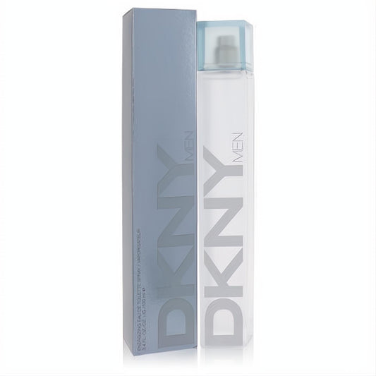 Discover DKNY Men 3.4 oz Eau De Toilette. A sleek clear bottle with light blue cap, presented with its modern blue box.