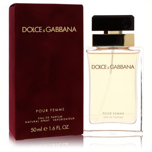 Luxurious Dolce & Gabbana Pour Femme 1.6 oz EDP in elegant clear bottle with gold cap, beside its rich burgundy box.
