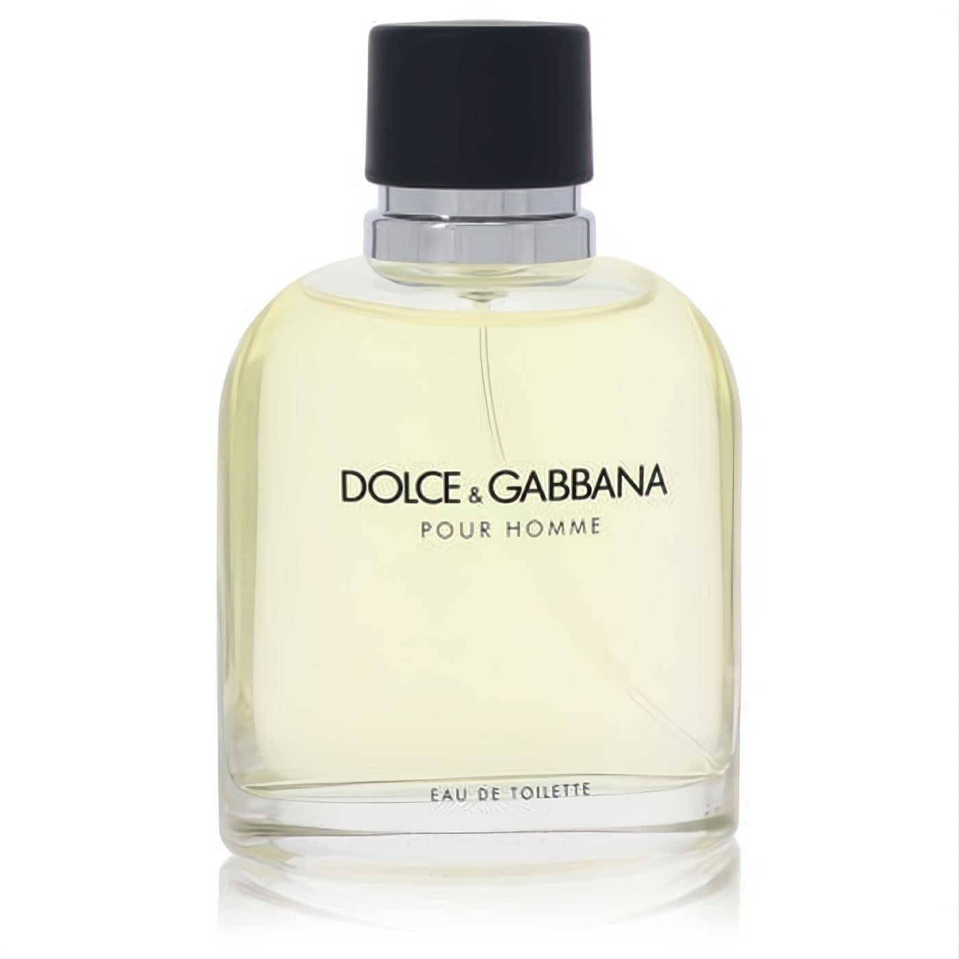 Dolce & Gabbana Pour Homme Eau De Toilette spray. Clear glass bottle with light yellow fragrance, sleek black cap, and silver collar.