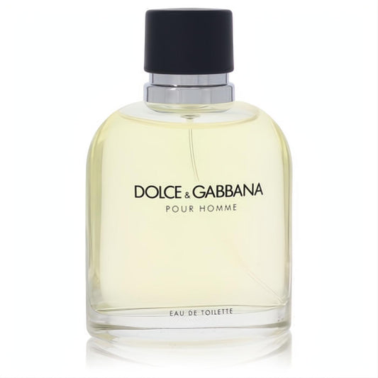 Dolce & Gabbana Pour Homme Eau De Toilette spray. Clear glass bottle with light yellow fragrance, sleek black cap, and silver collar.