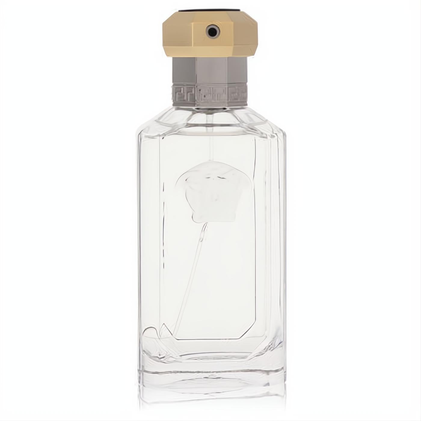 Dreamer by Versace EDT spray. Sleek clear glass bottle with iconic Medusa logo, gold cap, and silver Greek key detail.
