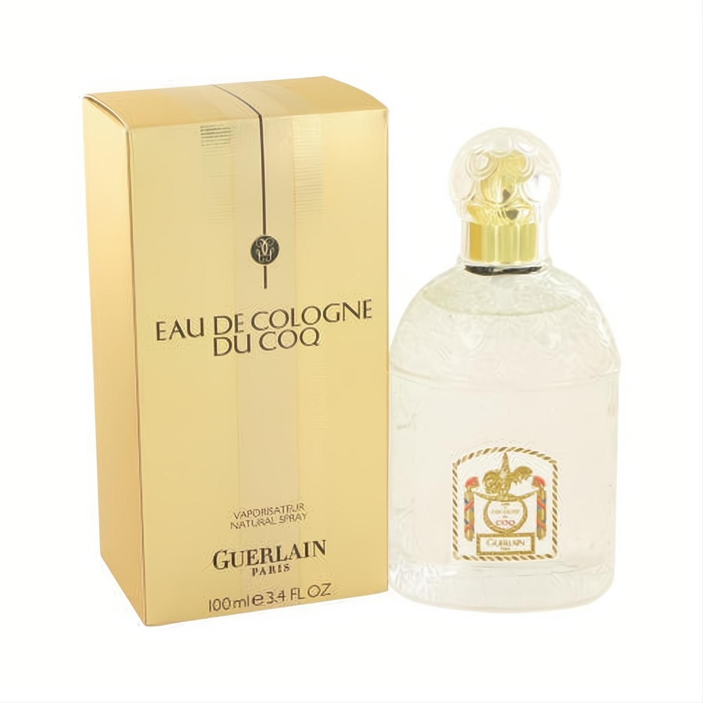 Guerlain Du Coq 3.4 oz unisex Eau De Cologne spray. Elegant clear ornate glass bottle with golden cap, beside its luxurious gold box.