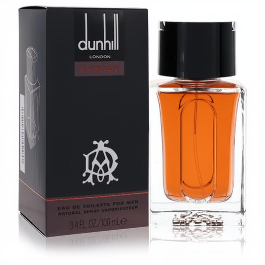 Dunhill Custom Eau De Toilette 3.4 oz for men. Clear glass bottle with amber liquid, sleek black cap, and matching black box.