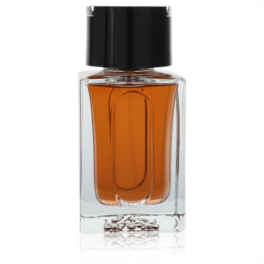 Dunhill Custom men's Eau De Toilette, 3.3 oz. Sleek clear glass bottle with warm amber fragrance and a glossy black cap.