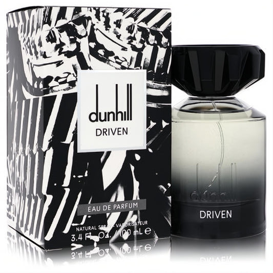 Sophisticated Dunhill Driven Black 3.4 oz EDP bottle with clear base, dark gradient, and bold black faceted cap, beside its striking abstract box.