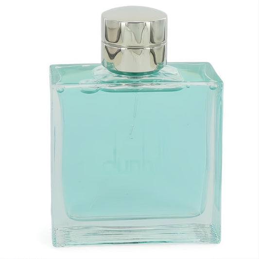 Dunhill Fresh men's EDT in a sleek, square clear glass bottle with refreshing blue fragrance and a silver cap.
