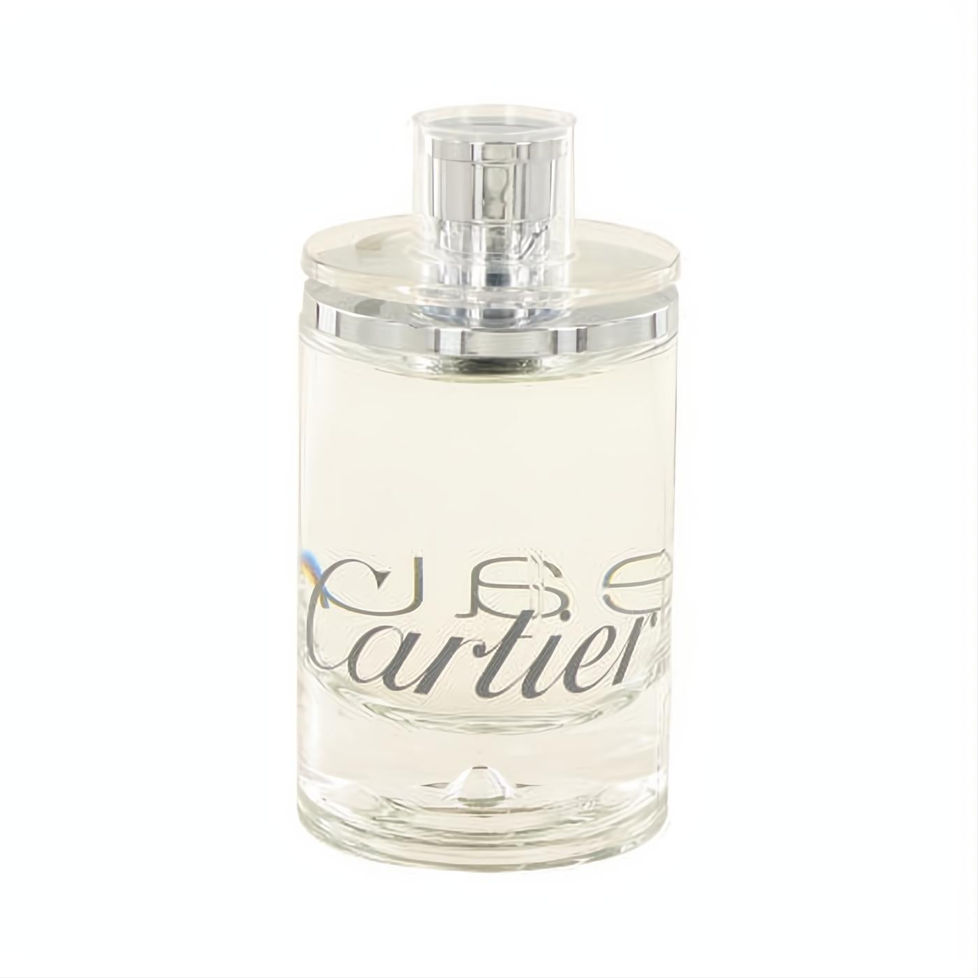 Elegant EAU DE CARTIER unisex EDT spray in a clear glass bottle with a sleek silver cap and iconic Cartier logo.