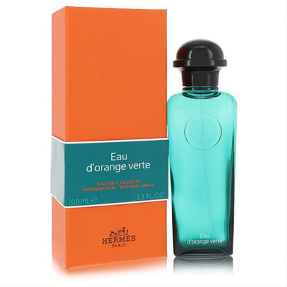 Vibrant Hermes Eau D'Orange Verte cologne spray, 3.3 FL.OZ. teal glass bottle with black cap beside its iconic orange box.