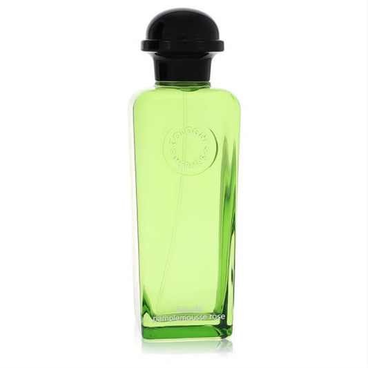 Elegant Hermes Eau De Pamplemousse Rose cologne in a vibrant lime green glass bottle with a sleek black cap.