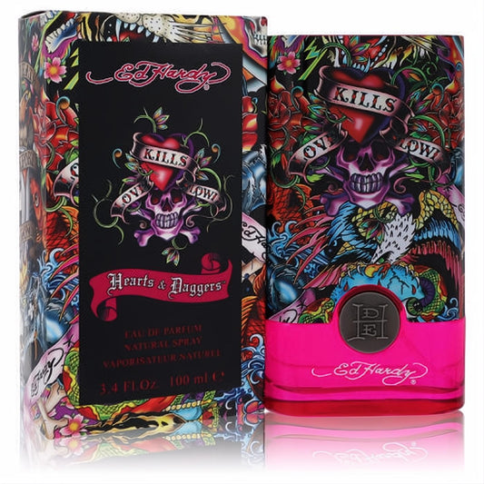 Ed Hardy Hearts & Daggers 3.4 oz EDP. Bold pink bottle with vibrant tattoo art, skulls, hearts, and "KILLS" banner. Unleash your daring fragrance.