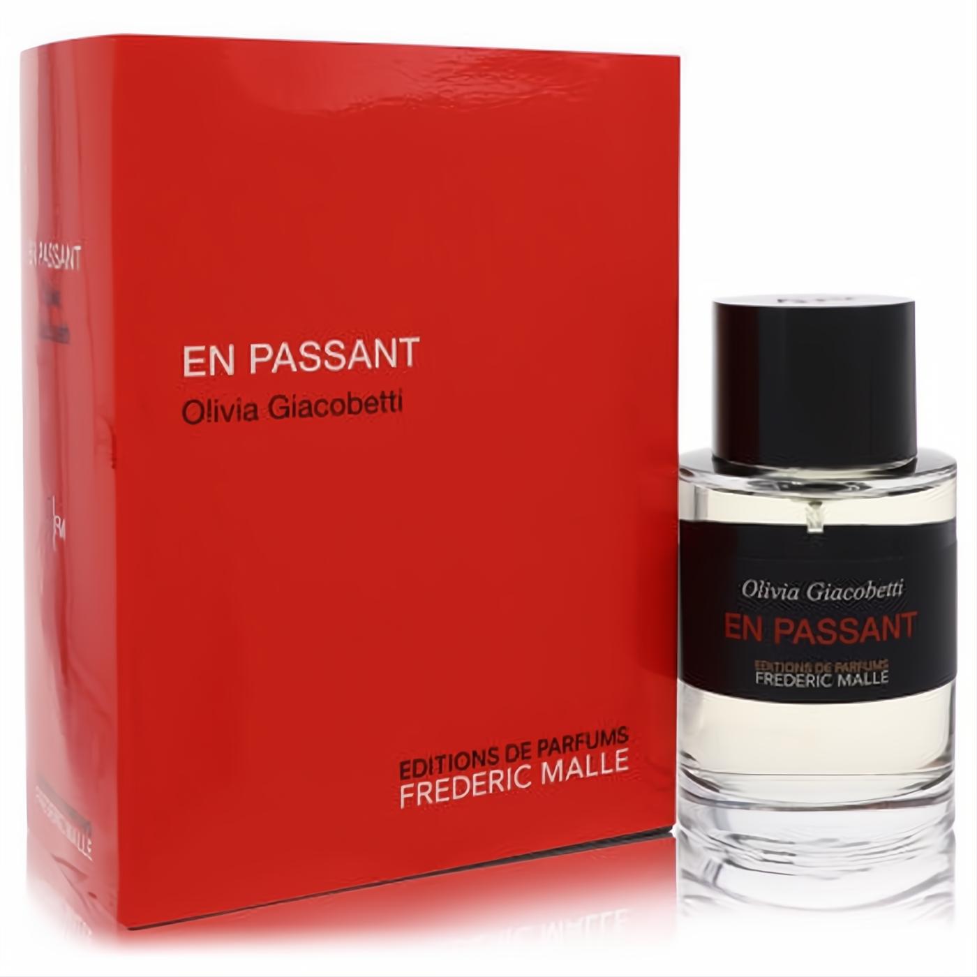 En Passant by Frederic Malle 3.4 oz EDP. Clear glass bottle with black & red label, next to its vibrant red box.