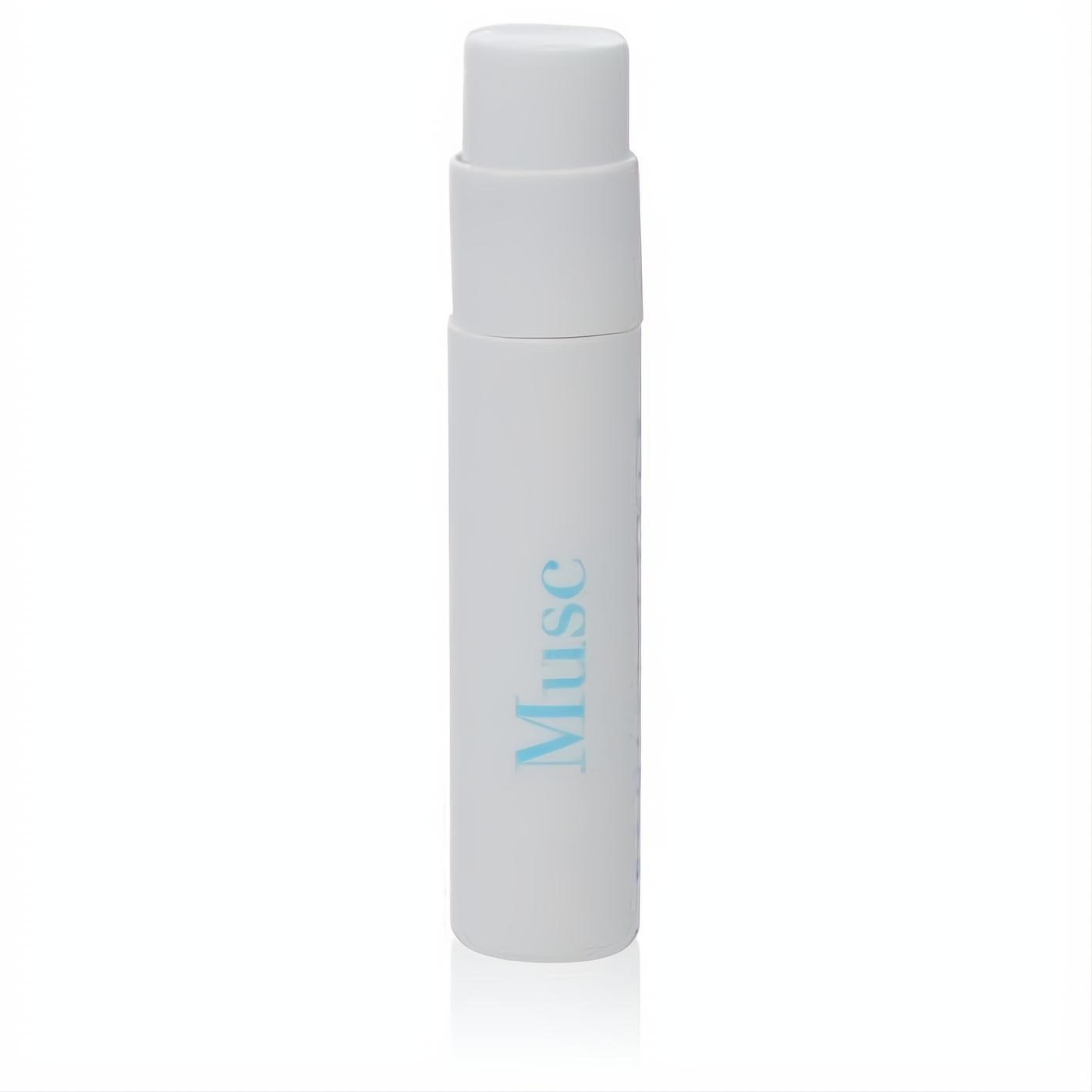Elegant white plastic Musc perfume sample spray vial, .04 oz, with light blue lettering. Ideal travel fragrance.