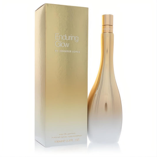 Enduring Glow by Jennifer Lopez 3.4 oz EDP spray. Elegant gold ombre bottle and matching box for a captivating scent.