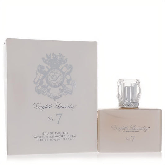 Elegant English Laundry No. 7 Eau De Parfum 3.4 oz spray. Features a sleek champagne bottle with a sparkling crystal cap and silver box.
