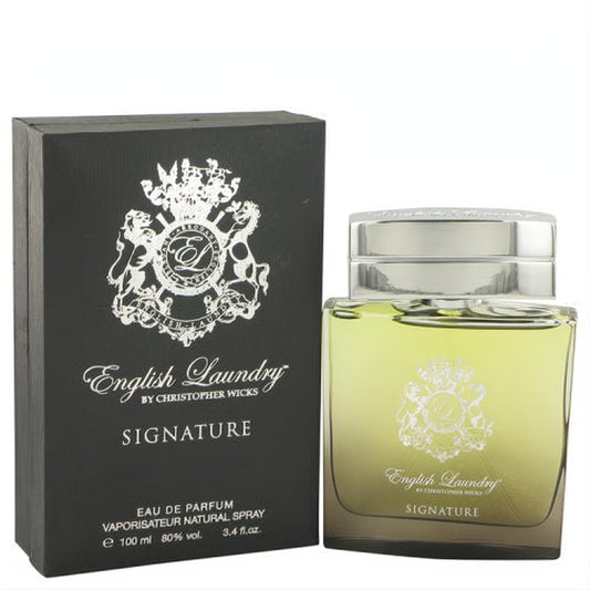 English Laundry Signature men's 3.4 oz Eau De Parfum. Elegant clear glass bottle with silver cap & yellow liquid, beside its sleek black box.