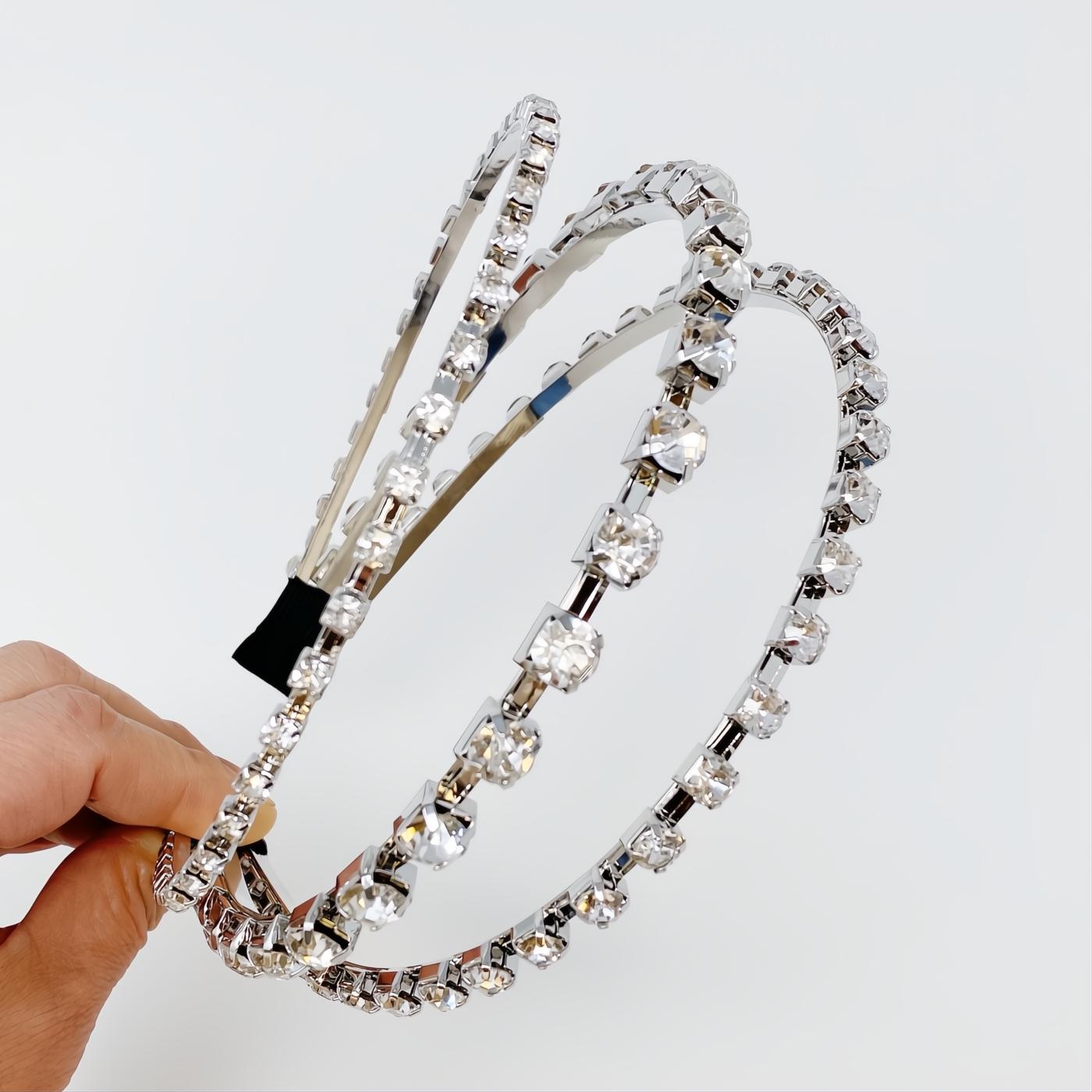 Dazzling silver triple-row headband adorned with brilliant clear crystals, perfect for elegant shine.