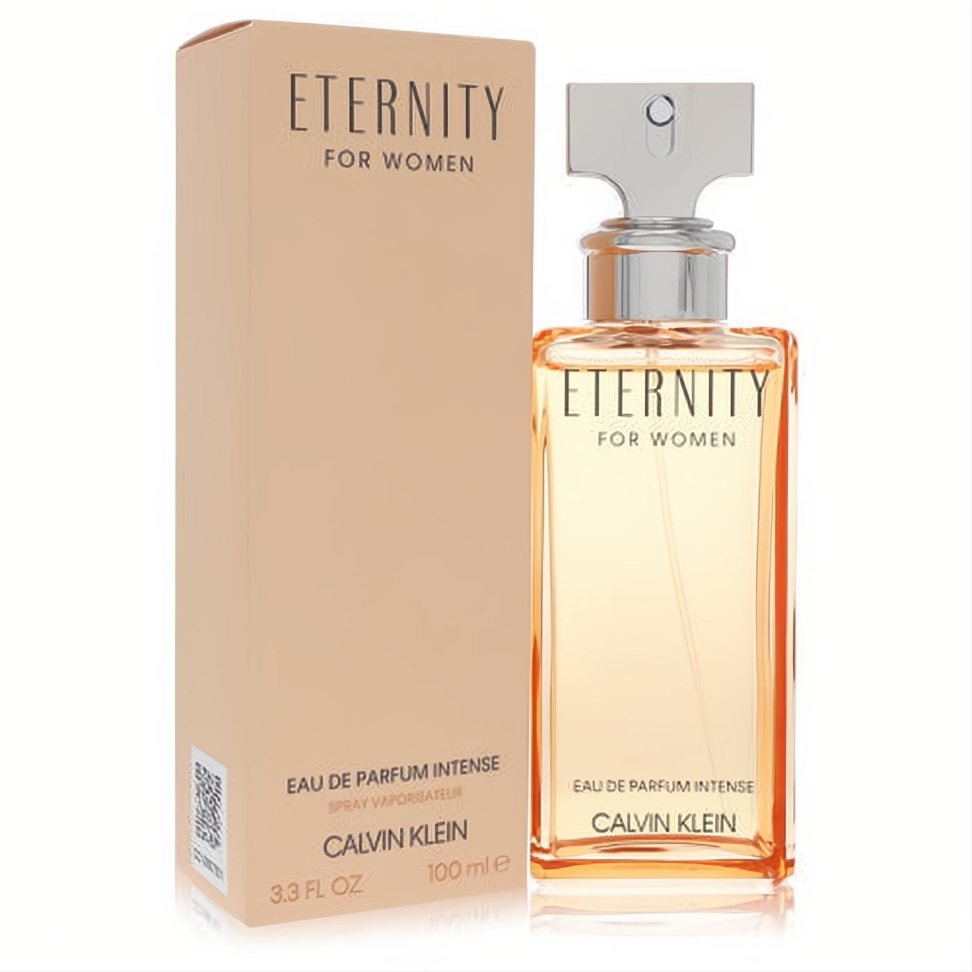 Eternity by Calvin Klein Eau De Parfum Intense 3.3 oz. Golden fragrance in a sleek glass bottle, displayed with its elegant peach box.
