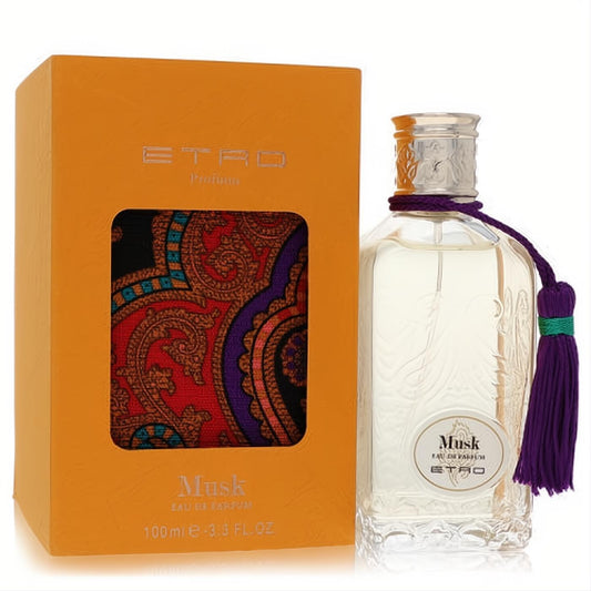 Luxurious Etro Musk 3.3 oz EDP spray. Clear embossed bottle with silver cap & purple tassel, beside an orange box with vibrant paisley.