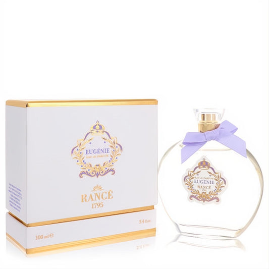Elegant Eugenie by Rance 3.4 oz women's Eau De Parfum. Clear round bottle with lavender bow, gold neck, and white box with gold trim.