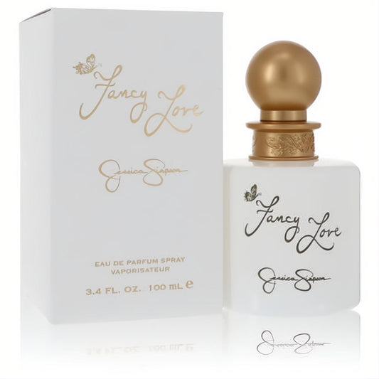Fancy Love by Jessica Simpson 3.4 oz EDP. Elegant frosted white bottle with gold script, butterfly, and luxurious gold cap, beside its box.