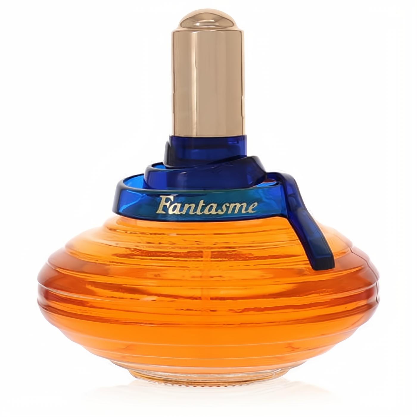 Captivating Fantasme Ted Lapidus 3.4 oz EDT. Amber liquid in a distinctive ribbed bottle, topped with a gold cap and blue "Fantasme" band.
