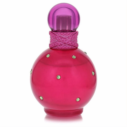 Experience Fantasy by Britney Spears! A dazzling fuchsia perfume bottle, adorned with sparkling green gems and a vibrant purple cap.