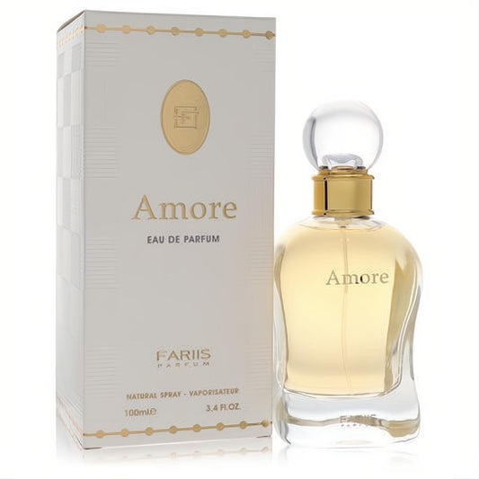 Fariis Amore 3.4 oz EDP. Elegant curved clear glass bottle with golden liquid, gold neck, and white luxury box.
