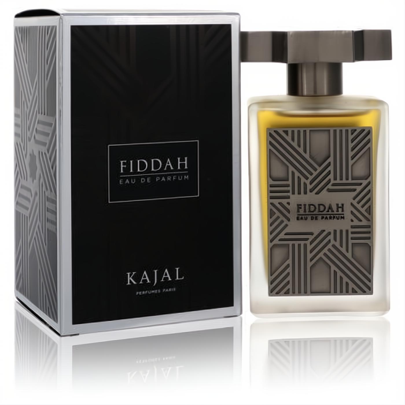 Sophisticated Fiddah by Kajal unisex fragrance. Frosted glass bottle with gold liquid, unique dark cap, and elegant black box with geometric pattern.