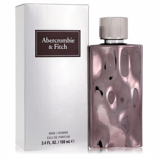 Abercrombie & Fitch First Instinct Extreme 3.4 oz men's EDP. Captivating iridescent bottle with unique textured design and sleek silver cap.