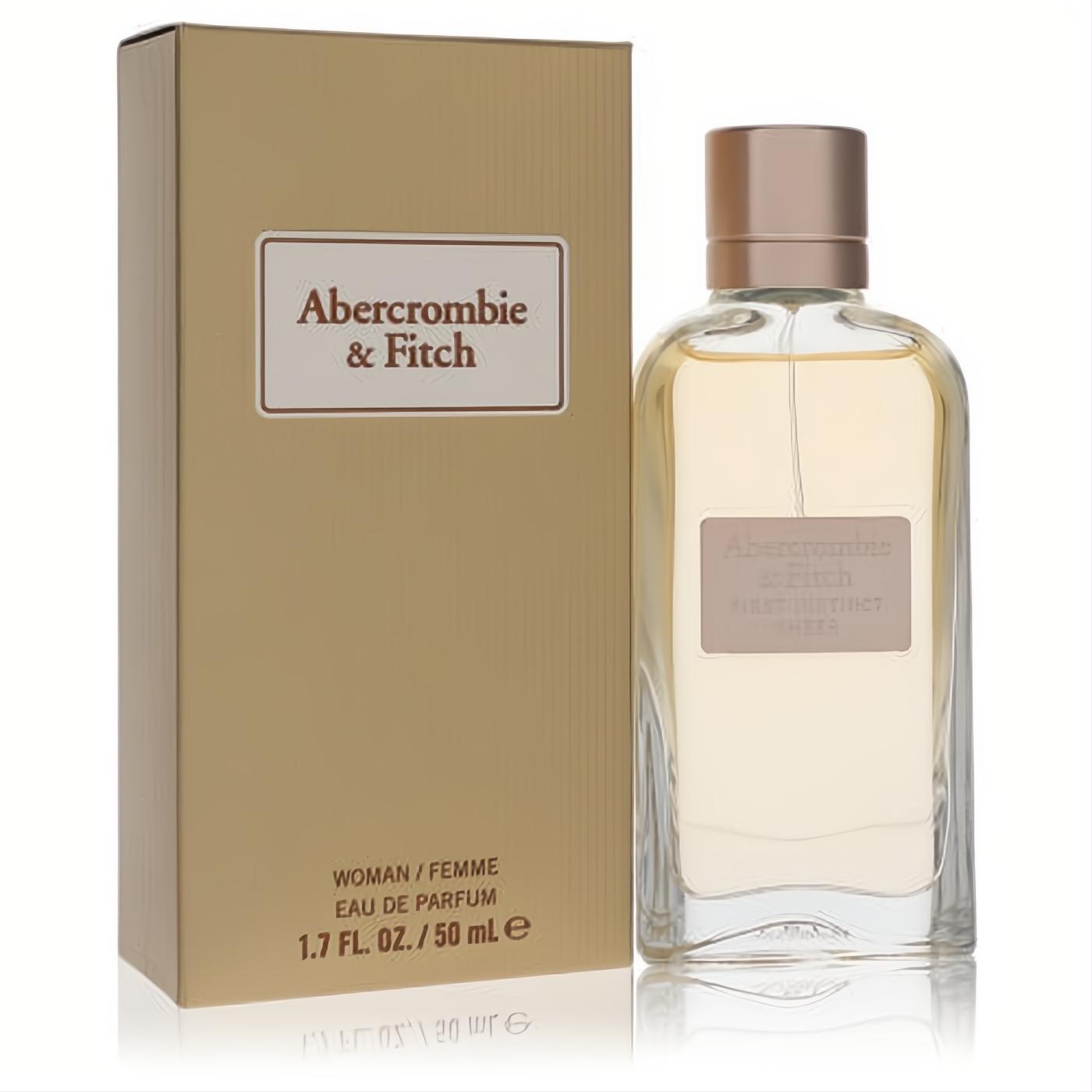 Abercrombie & Fitch First Instinct Sheer 1.7 oz EDP. Elegant clear glass bottle with rose gold cap and matching gold box.