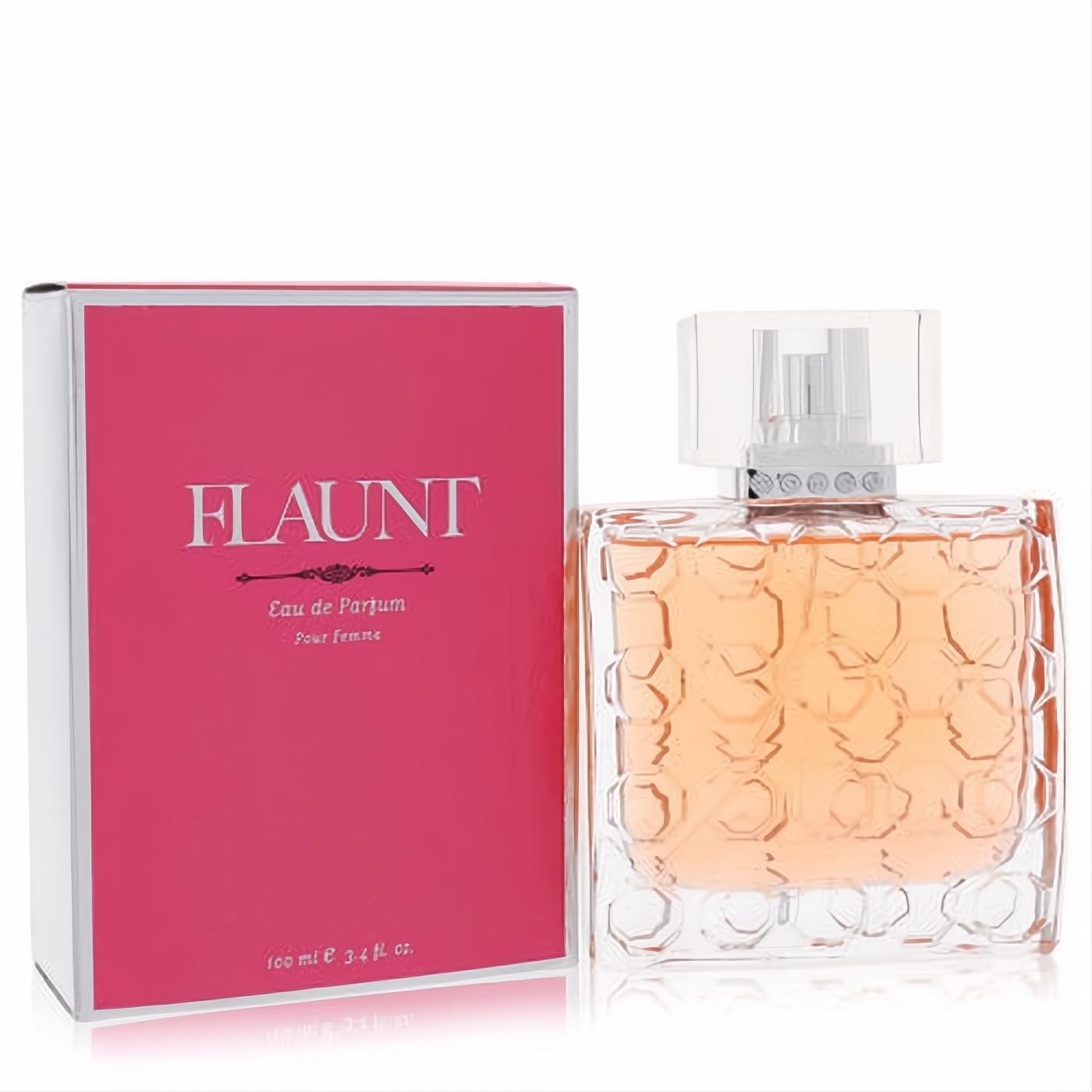 Flaunt Pour Femme 3.4 oz EDP in a stylish clear honeycomb glass bottle with silver sprayer, next to its vibrant hot pink box.