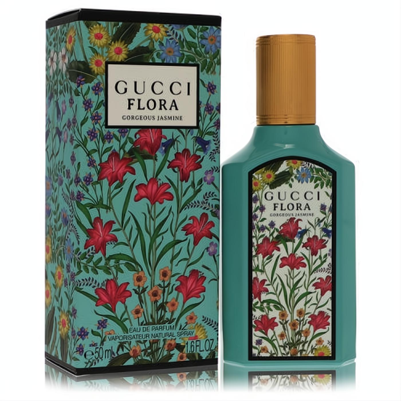 Gucci Flora Gorgeous Jasmine 1.6 oz EDP. Vibrant teal bottle with gold cap & matching box showcase elegant floral designs.