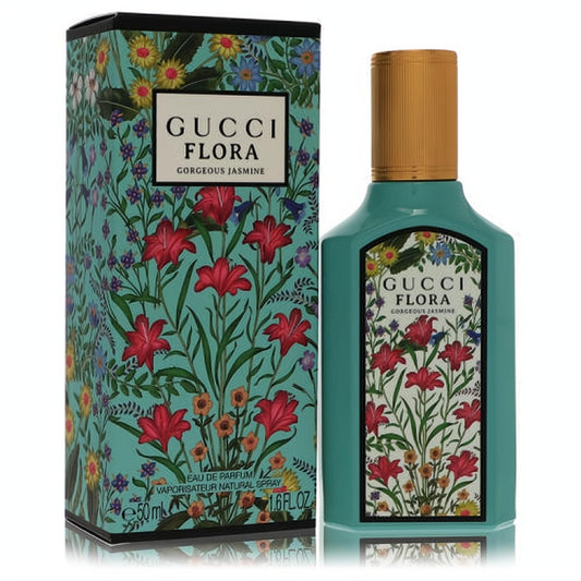 Gucci Flora Gorgeous Jasmine 1.6 oz EDP. Vibrant teal bottle with gold cap & matching box showcase elegant floral designs.