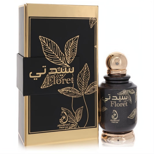 Sophisticated Floret by Arabiyat Prestige 3.4 oz EDP. Black glass bottle, gold cap, and matching black & gold box with elegant leaf design.
