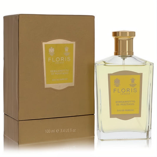 Floris Bergamotto Di Positano 3.4 oz EDP. Clear glass bottle, elegant gold cap, and luxurious textured gold box.