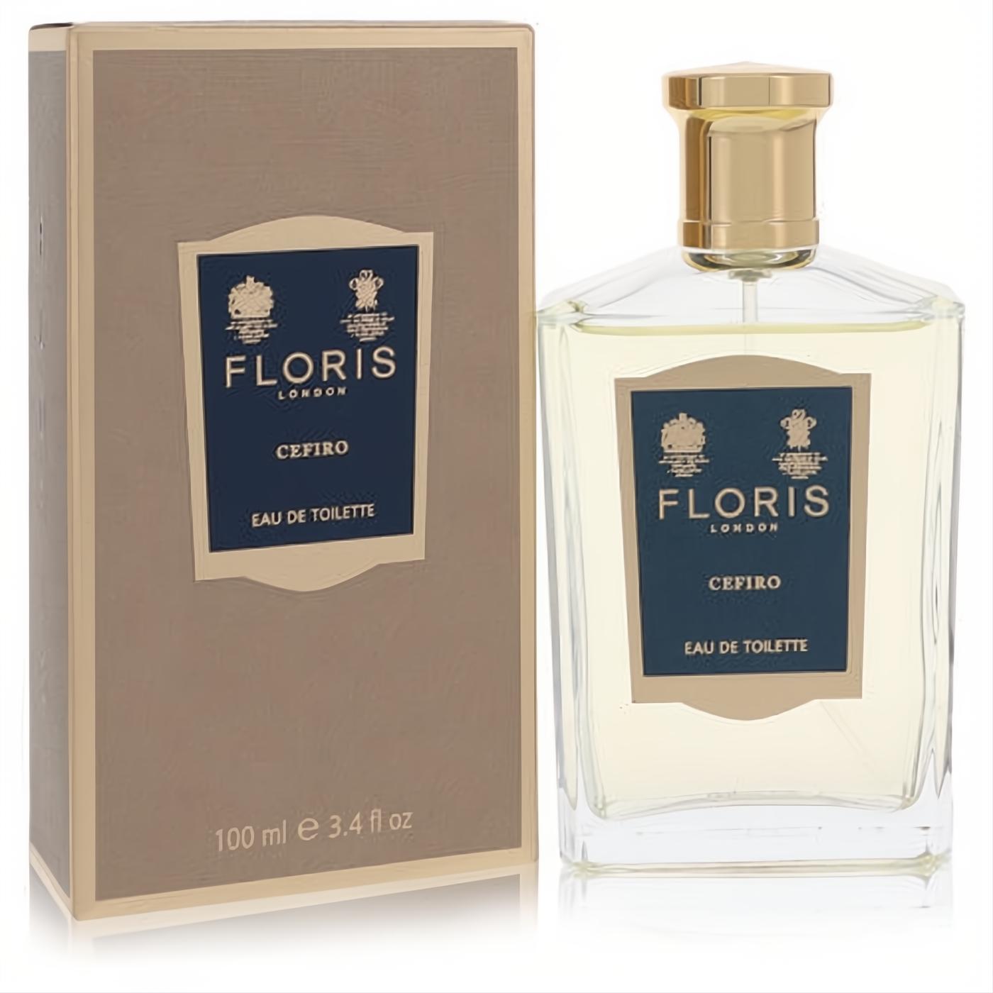 Luxurious Floris Cefiro 3.4 oz Eau De Toilette in a clear glass bottle with a gleaming gold cap, alongside its elegant beige box.
