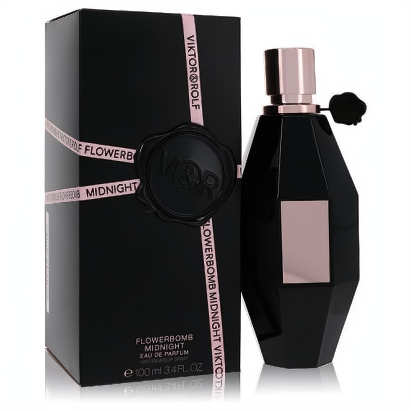 Elegant Viktor & Rolf Flowerbomb Midnight 3.4 oz EDP. Black faceted bottle with rose gold cap and label, paired with its sleek black and pink box.