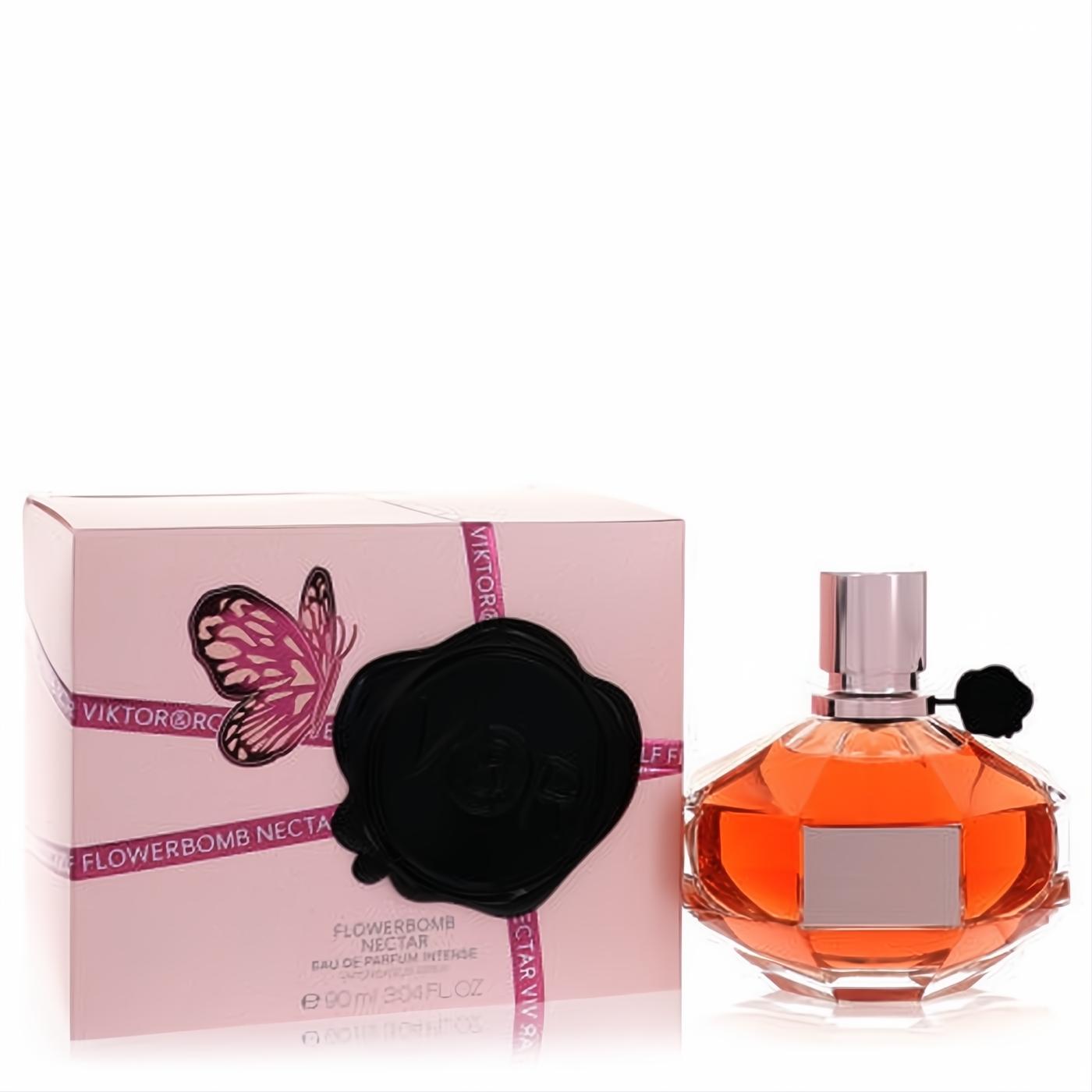 Luxurious Viktor & Rolf Flowerbomb Nectar 3.04 oz EDP Intense. Faceted amber bottle with black bow, pink box with butterfly and VR seal.