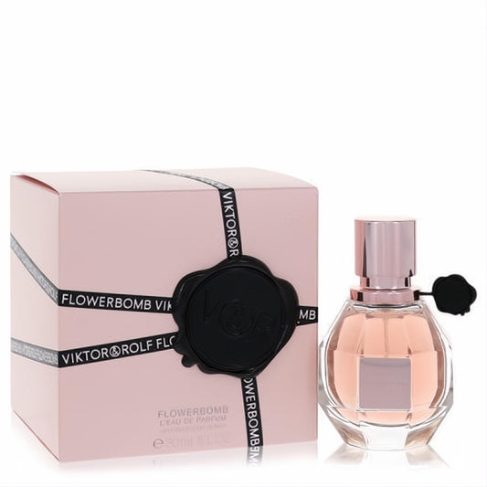 Experience Flowerbomb by Viktor & Rolf 1 oz EDP. Iconic grenade-shaped bottle with rose gold cap and elegant pink gift box.